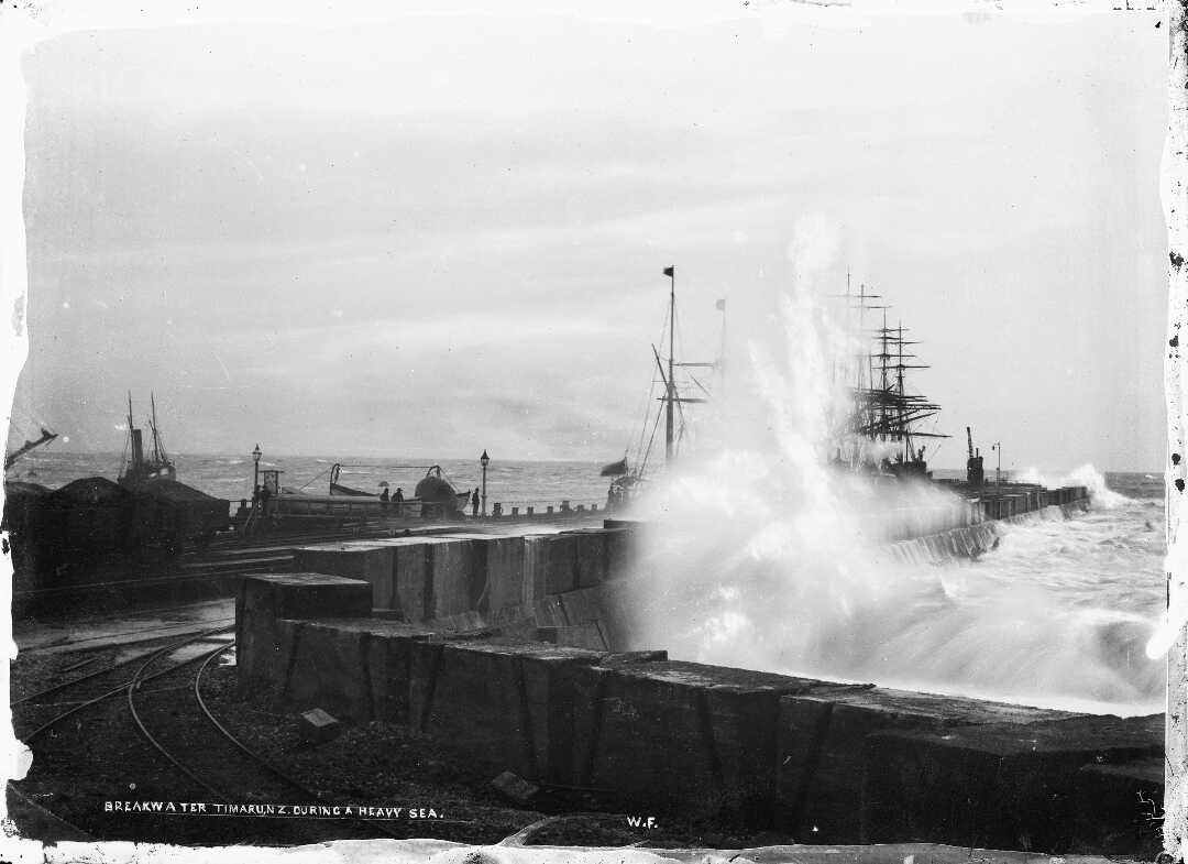 Timaru breakwater photographed by William Ferrier circa 1896-1899.